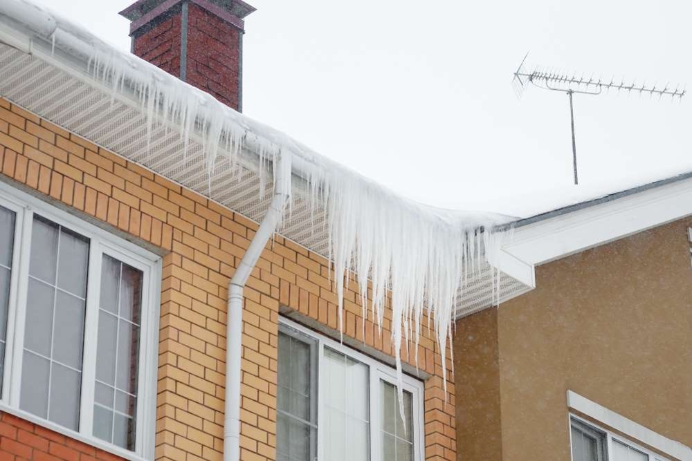 Top Toitures inc. - Déneigement de toiture